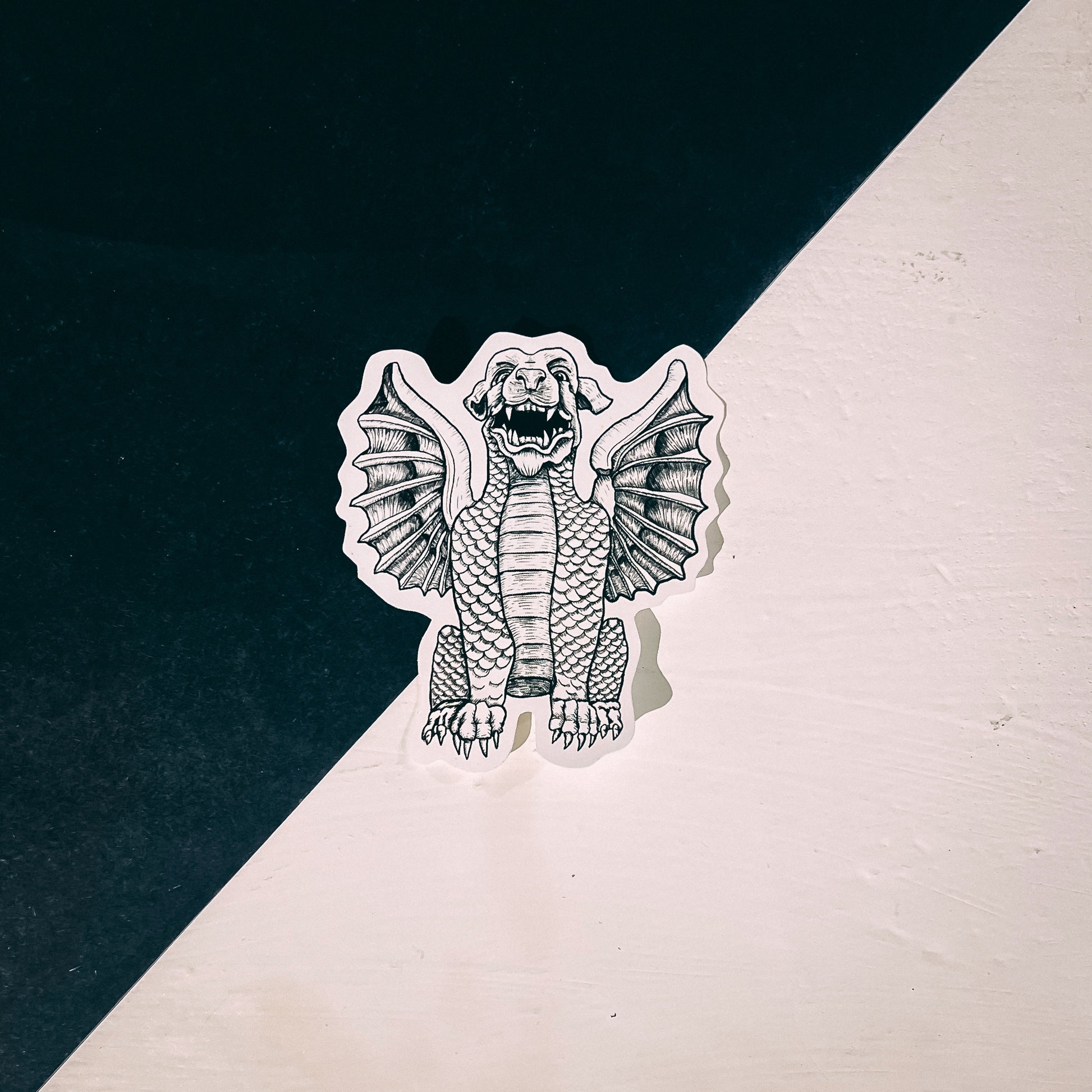 Black and white illustration of a winged  gargoyle sticker 