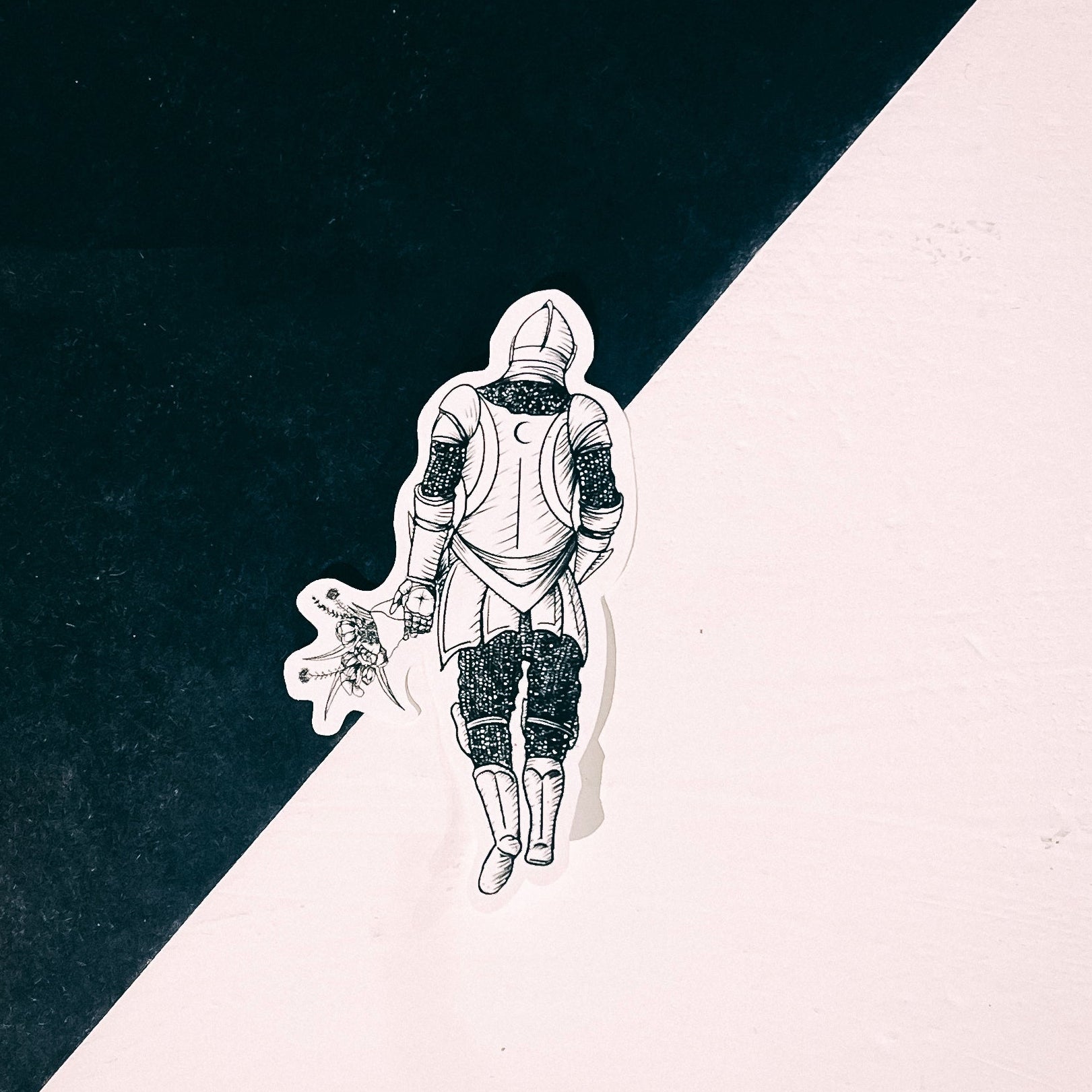 A sticker of a knight holding flowers 

