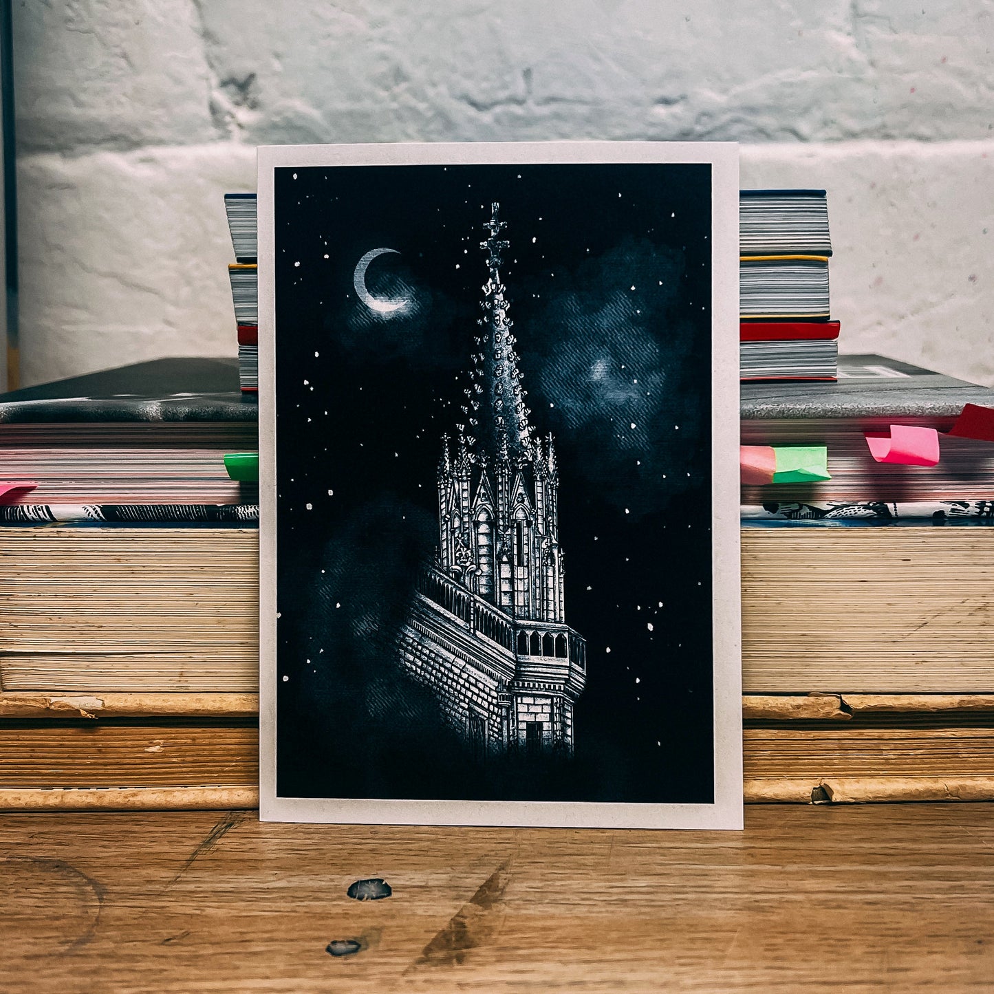 Postcard of spire of national portrait gallery in Edinburgh in night sky 