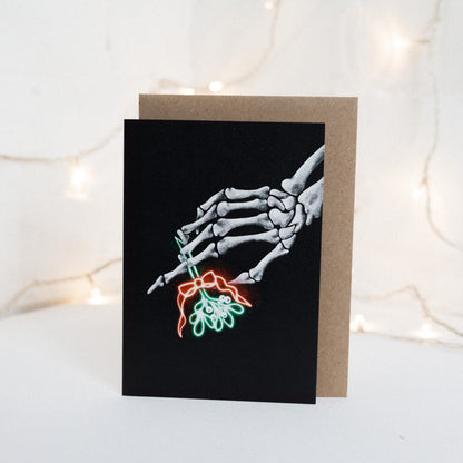 Skeleton With Neon Mistletoe Gothic Christmas Card