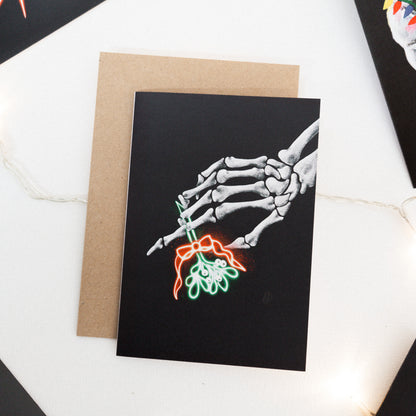 Skeleton With Neon Mistletoe Gothic Christmas Card