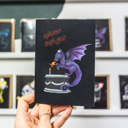 Purple dragon on cake birthday card