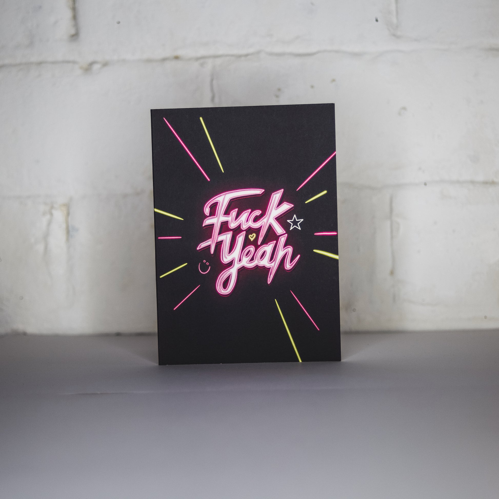 Greetings Card with Pink Neon Fuck Yeah Writing by Wayward